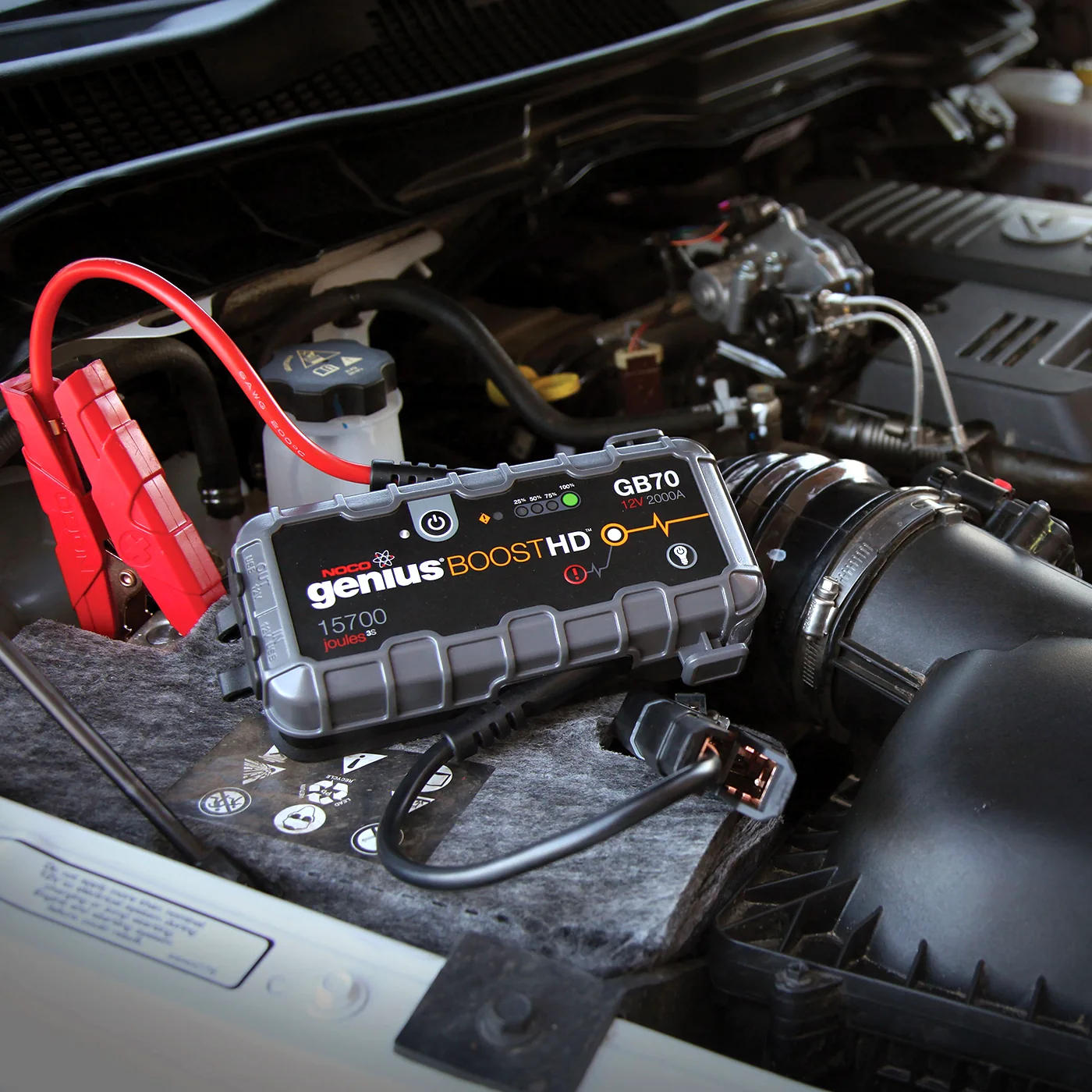NOCO jump-start pack connected in an engine bay