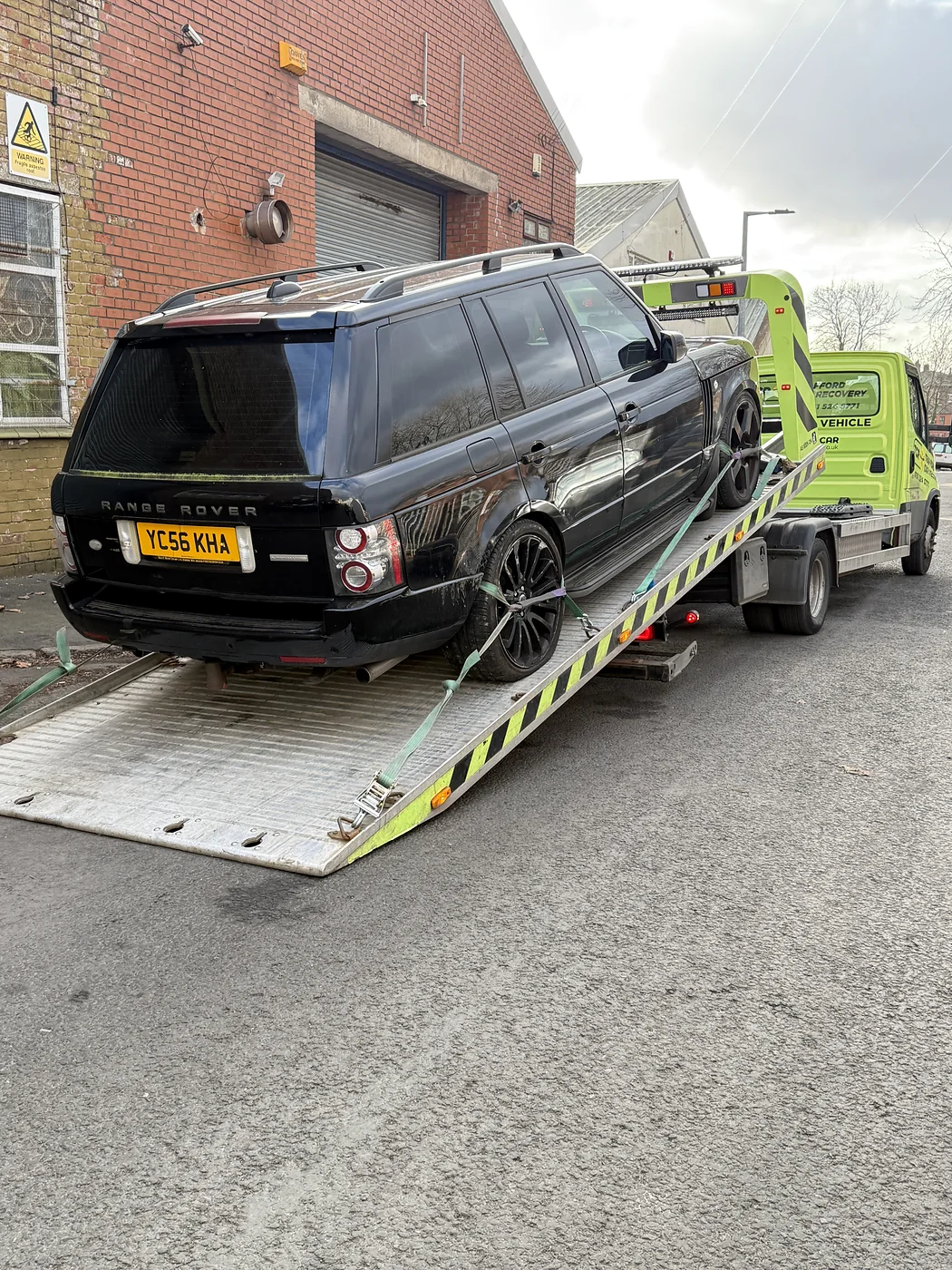 Black Range Rover at a recovery ramp