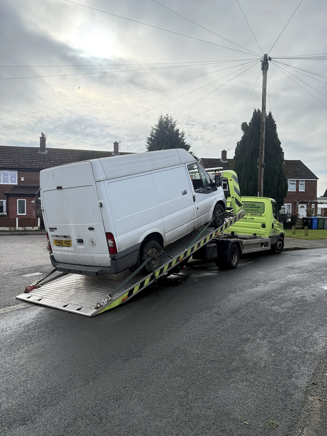 A van collected near Sale and transported to Salford.