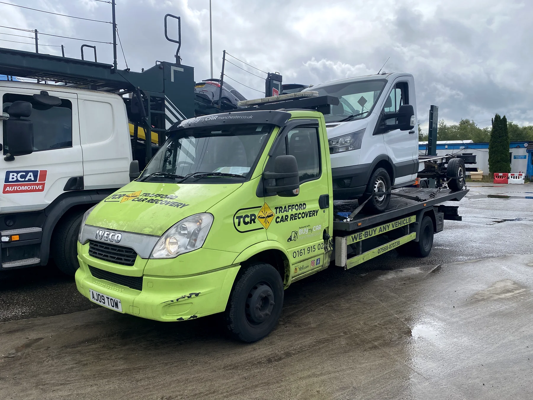 A van recovery near Urmston, with delivery to a garage in Greater Manchester.
